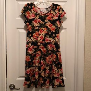 Black dress with pink, yellow, and orange flowers.